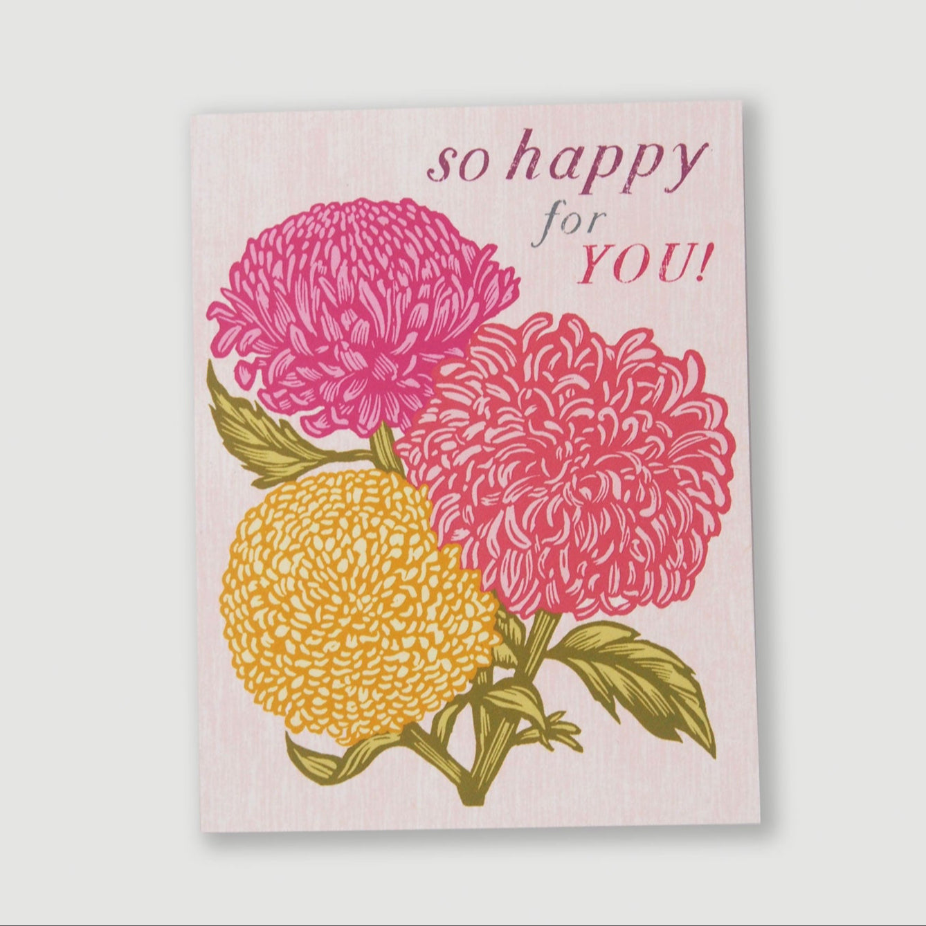 Card with pink and yellow chrysanthemum flowers and 'so happy for YOU!' text on a light pink background